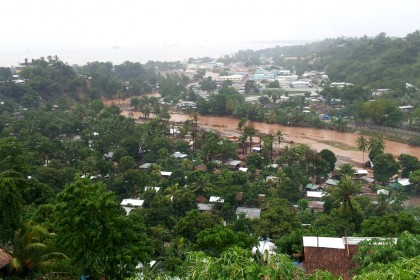 Residents near the Matanikau river as viewed from Skyline. Photo credit: SIBC.