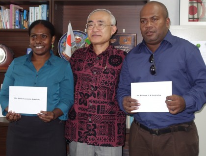 The two students and His Excellency the Janpanese Ambassador to Solomon Islands. Photo: SIBC.