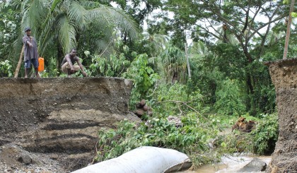 A destroyed road during the recent flash floods. Photo credit: SIBC.