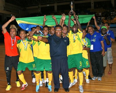 The Solomon Islands National Futsal team celebrating their win in 2009. Photo credit: Oceania Football.