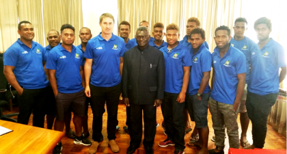 Prime Minister Manasseh Sogavare with the Kurukuru team in blue before their departure to Colombia this year. Photo credit: OPMC.