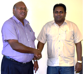 Permanent Secretary of MDPAC Shaddrack Fanega and Mr Hasmukh Lal. Photo credit: GCU.