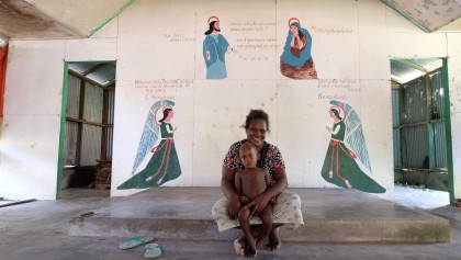 Victoria, from Kuila Village, spoke to the team about development issues in her village. This is her in the catholic church which was half-built, then abandoned. 