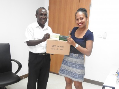 MP for NW Choiseul Constituency, Hon. Connelly Sadakabatu with SIBC sales manager Gloria Hong